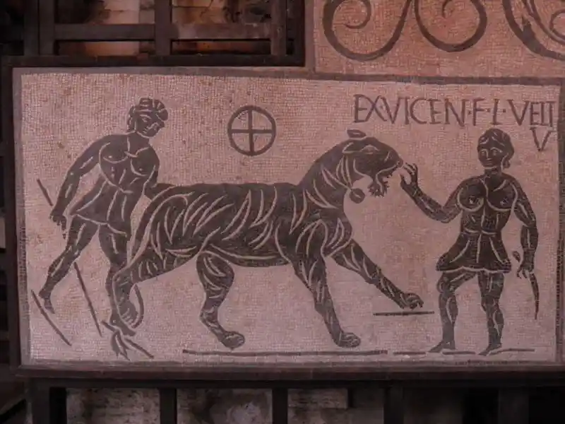 Solar cross on a black and white roman mosaic